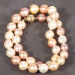 A cultured freshwater pearl necklace, of pink, peach, purple, white and grey hues with a 9ct gold