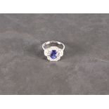 A tanzanite and diamond set ring, the stones set in 18ct white gold