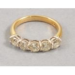 A five stone diamond ring,  claw set in an 18ct yellow gold band, total 1.53ct