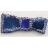 Andrew LOGAN (British b. 1945) Blue mirrored brooch in the form of a bowtie, Signed and dated 2013