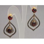 A pair of garnet and diamond drop earrings, set in 14ct gold and silver, boxed