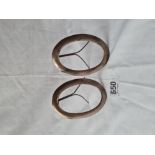 A pair of Chinese oval photo frame mounts - 3.5" high