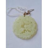 A carved jade dragon pendant - 30gms