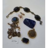 A piece of lapis and locket, chain and clasps