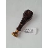 A Cornelian intaglio desk seal with agate handle