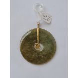A 14ct mounted jadeite pendant