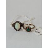 An opal set ring and 1 other