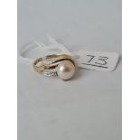 A pearl & diamond (.10) ring in 9ct - size J - 1.90gms