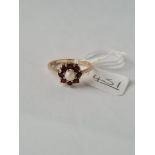 A garnet & pearl cluster ring in 9ct - size P - 2.3gms