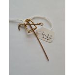 A gold stick pin with strip & hunting crop - 2.6gms