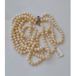 A triple row pearl necklace