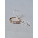 A 5 stone ring in 18ct gold - size T - 2.45gms