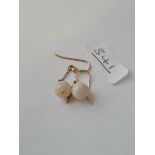 A pair of opal ball earrings in 9ct
