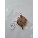 A ladies ROLEX wrist watch in 9ct - no hands