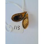 Antique gold mussel shell locket