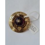 An antique Cabochon-set brooch in gold