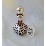 A silver overlay red glass scent bottle and stopper - 3.5" high