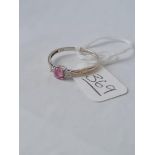 A diamond & pink stone ring in 9ct white gold marked DIA - size Q.5 - 1.50gms