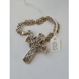 A Celtic-style silver cross and bracelet