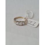 A 3 white stone ring in 9ct - size N - 3.03gms