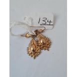 A pair of gilt metal earrings