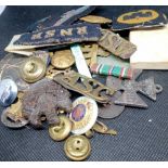 A bag of badges, buttons etc
