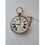 A large silver gents pocket watch with seconds dial