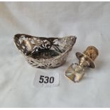 A boat-shaped pierced dish with import mark for 1903 and a Victorian bottle stopper 1882