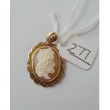 A cameo pendant set in gold - 3gms