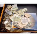 Box of world coins and banknotes