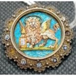 AN UNUSUAL SILVER AND ENAMEL BROOCH OF A WINGED LION (NO PIN)