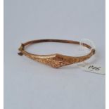 An hinged bangle in 9ct rose gold 4.6g inc