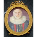 A painted miniature on ivory of a bearded gents in Elizabethan costume in decorative easel backed
