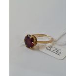 A garnet ring in 9ct - size Q - 3.2gms