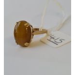 A tiger's eye ring in 9ct - size J