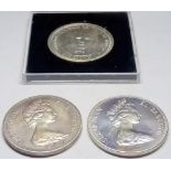 Three cased silver crowns