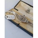 A cased DECO ladies diamond & sapphire cocktail watch in 18ct gold