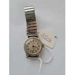 A metal war time CYMA wrist watch with seconds dial