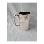 A plain Victorian pint tankard with scroll handle - 4.75" high - London 1879 by TW - 288gms