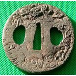 A carved TSUBA with dragon
