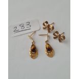 Two pairs of 9ct earrings (1 x ribbons and one other)