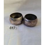 A pair of hammered barrel-shaped napkin rings - Sheffield 1909 by W&H - 73gms