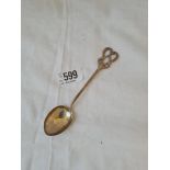 An art nouveau-style spoon with ornate handle - London 1909 by WB