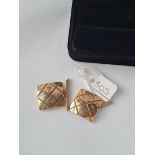 A GOOD HEAVY PAIR OF SQUARE CUFFLINKS WITH TWO DIAMOND INSETS - 16.gms