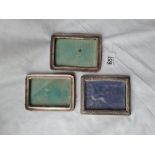 Three mounted photo frames, one with ribbon border - 4" high