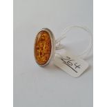 A silver amber ring - size O -