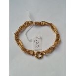 A fancy link bracelet in 9ct - marked 375 - 8.44gms