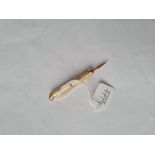 A 9ct tooth pick - 5.7gms
