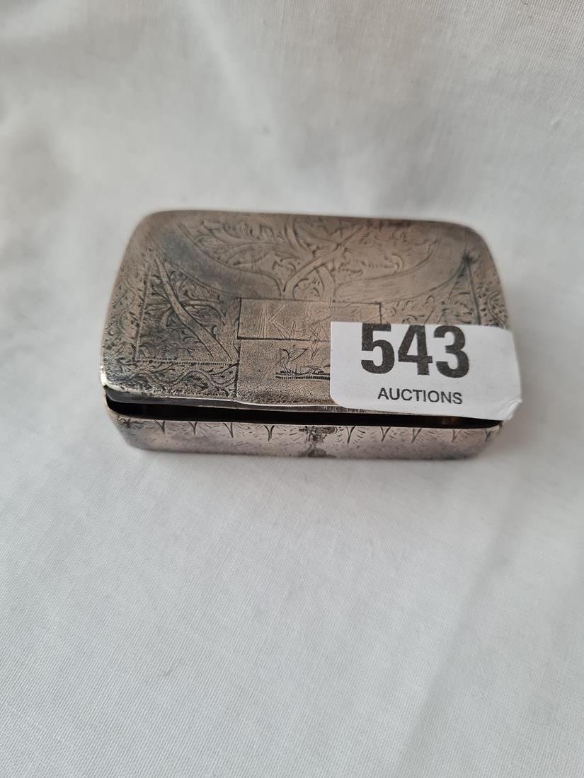 A continental snuff box engraved with foliage - 2.5" long - unmarked - 81gms