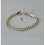 A silver and CZ line bracelet